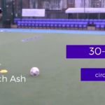 Player dribbling football with cones and goal